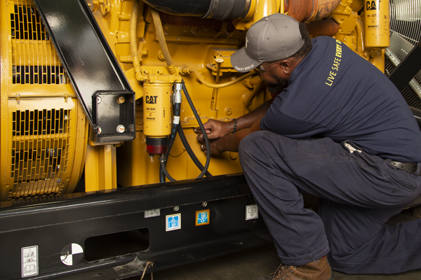 Yancey Technician Repairing on Cat Generator
