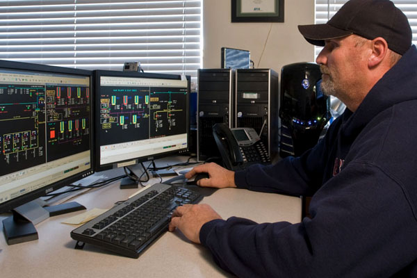 Yancey Technician Working On Computer Models